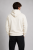 Tył minimalistycznej bluzy hoodie premium w kolorze ecru. Prosty fason bez nadruków oraz staranne wykończenie nadają bluzie nowoczesny i elegancki charakter.